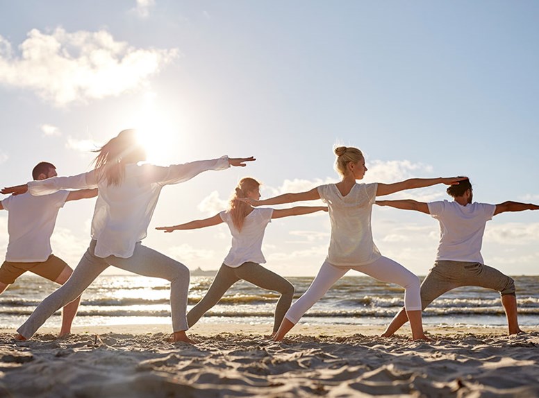 Yoga op het strand
